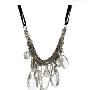 Clear silver necklace with black ribbon